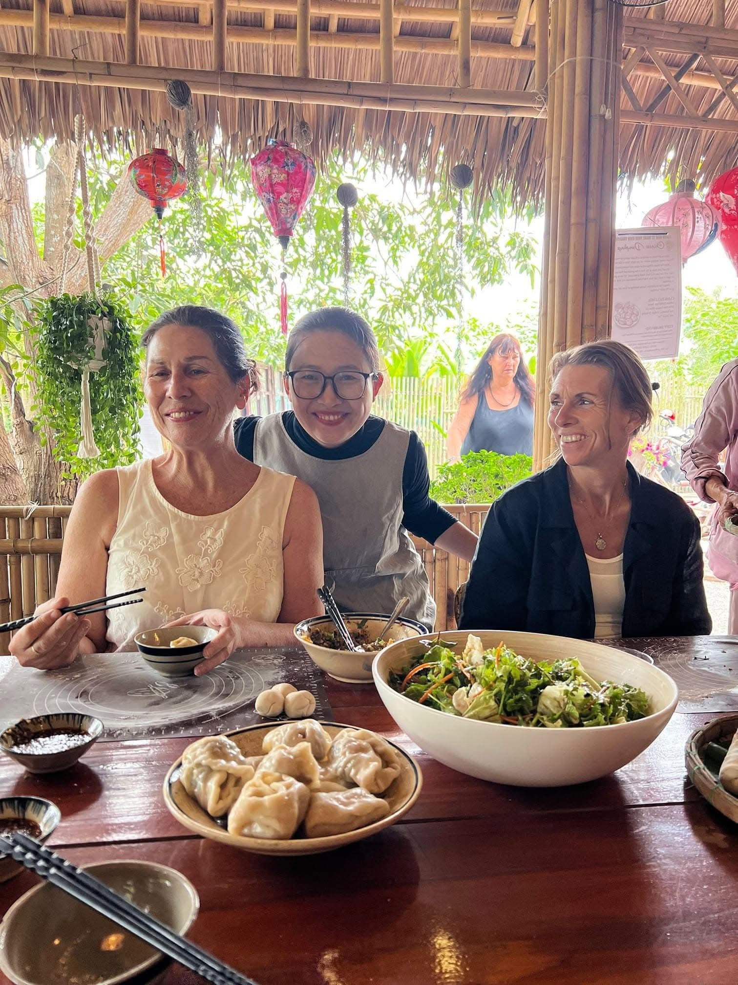 Bong with guests and a plate of fresh dumplings